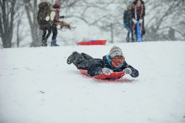 Little Boy Lying Sled Going Hill Snow — Stock Photo, Image