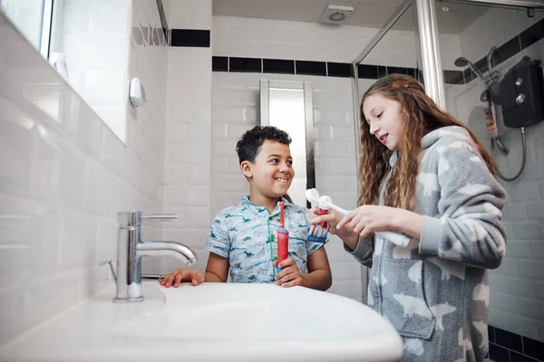 Little Boy His Older Sister Brushing Teeth Together Bathroom Home — Stock Photo, Image