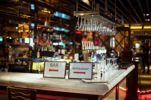 Interior Shot Restaurant Bar Counter Which Has Signs Pointing Either — Stock Photo, Image