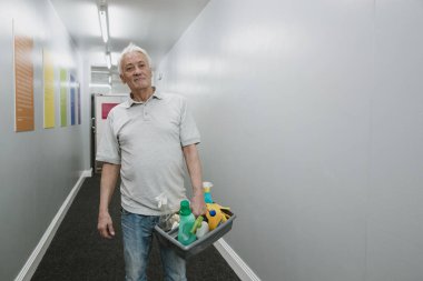 Portrait of a Senior Cleaner clipart