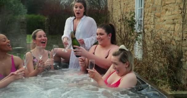 Small Group Female Friends Socialising Relaxing Hot Tub Weekend Away — Stock Video