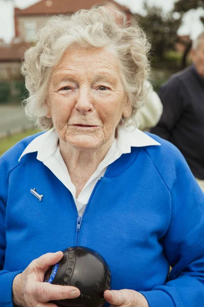 Senior Woman With a Bocce Ball — Stock Photo, Image