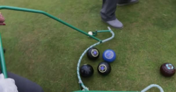 Senior Man Can Seen Collecting Group Bocce Balls Using Pick — Stock Video