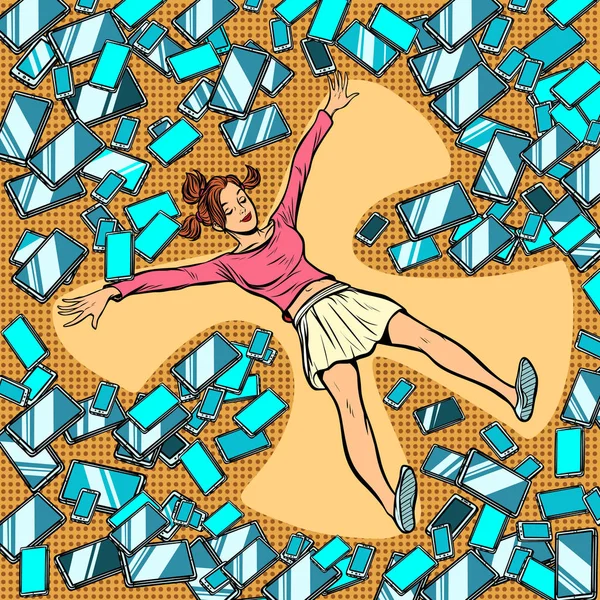 Genç kadın kar melek becerikli alet, telefonlar ve tabletler yapma