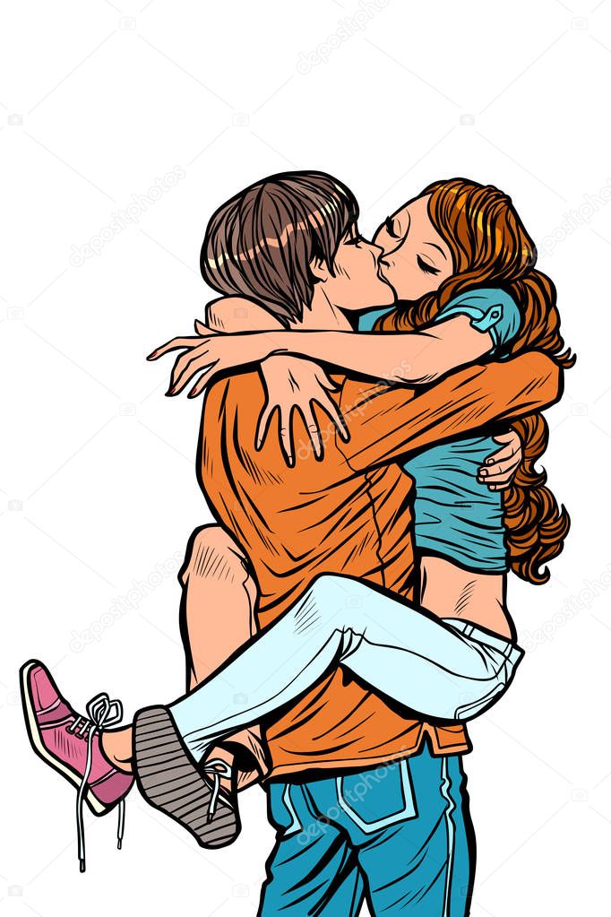 couple in love hugs passionate kiss. man holding woman in his arms