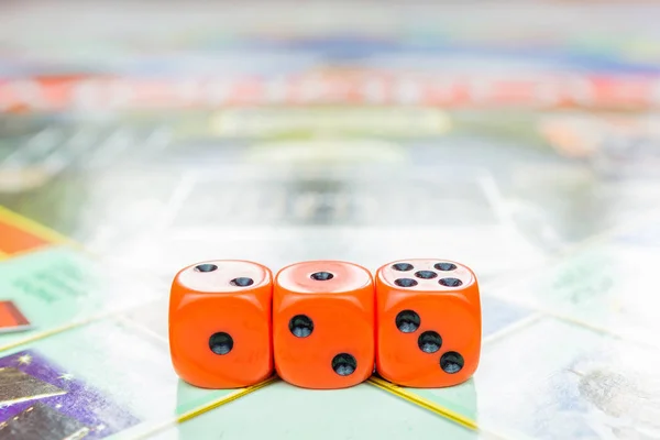 cubes lie on the board game monopoly