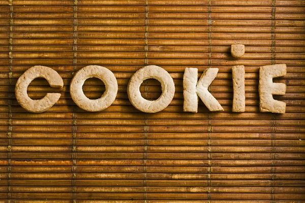 Cookie Word Composed Homemade Biscuits Letters Arranged Wooden Background — Stock Photo, Image