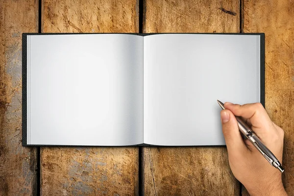 Escrita Mão Com Esferográfica Branco Livro Aberto Mesa Madeira — Fotografia de Stock