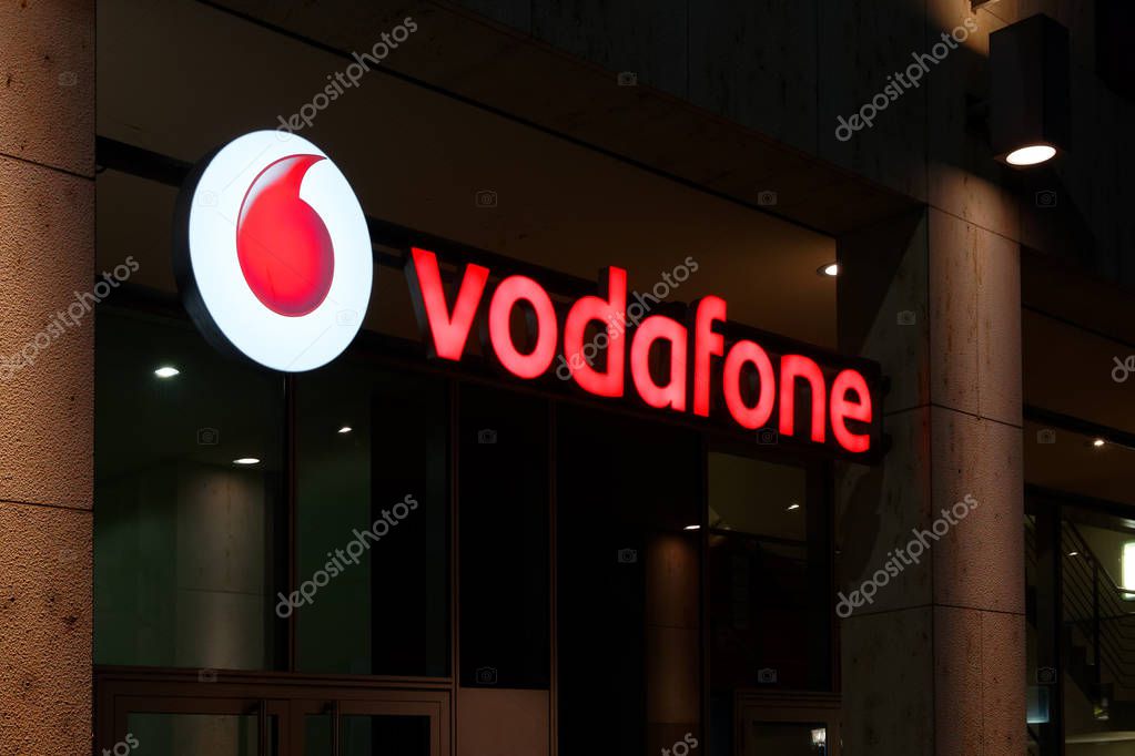 Karlsruhe, Germany - Sept 2018: Vodafone mobile operator neon sign