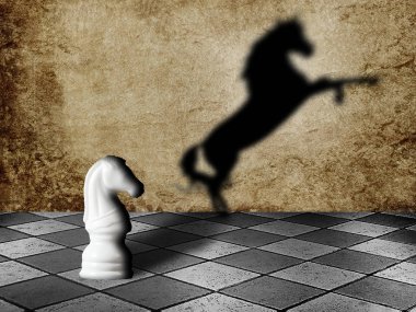 Chess horse with shadow as a wild horse on a chessboard. Potentiality concept clipart