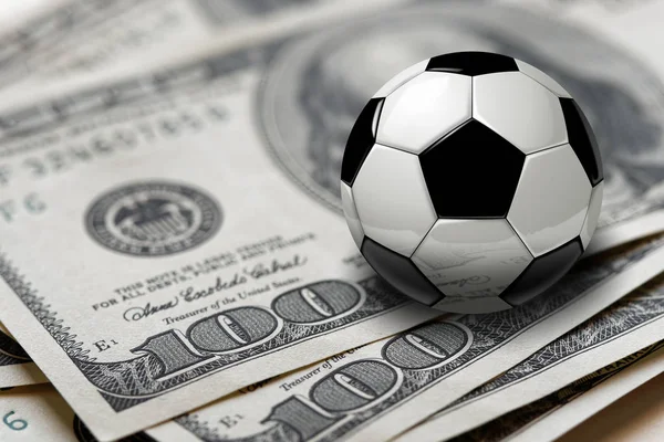 Football ou ballon de football sur billets de 100 dollars gros plan — Photo