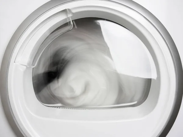 Washing machine porthole closeup working front view — Stock Photo, Image
