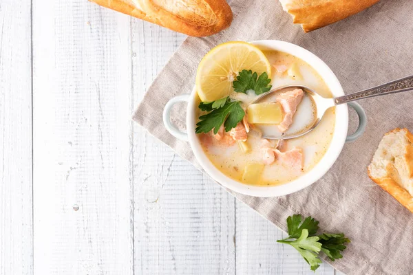 Finnish creamy soup with salmon, potatoes, onions, and carrots — Stock Image Finnish creamy soup with salmon, potatoes, onions, and carrots Royalty Free Stock Photos