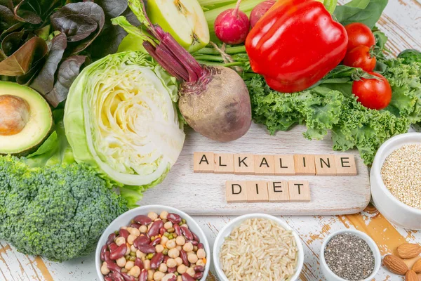 Alkaline diet concept - fresh foods on rustic background — Stock Photo, Image