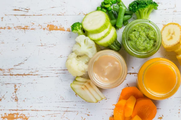 # Colorful baby food purees in glass jar # — Stok Foto