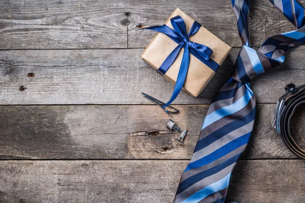 Fathers day concept - present, tie on rustic wood background — Stock Photo, Image