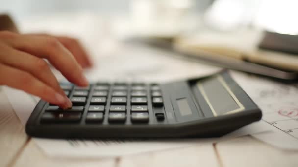 Female hands use calculator. Office work. Tax day concept — Stock Video