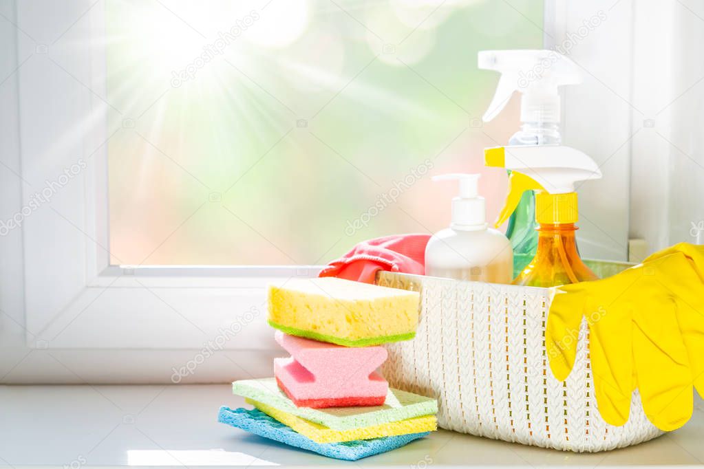 Spring cleaning concept - cleaning products, gloves