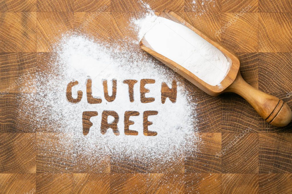 Gluten free concept - text on rice flour