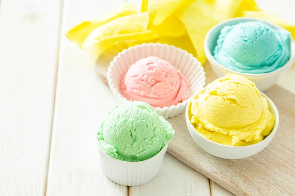 Pastel ice cream in white bowls — Stock Photo, Image