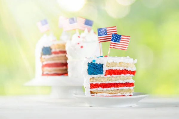 American national holidays concept - 4th of July, Memorial Day, Labour Day. Layered spounge cake in USA flag colours