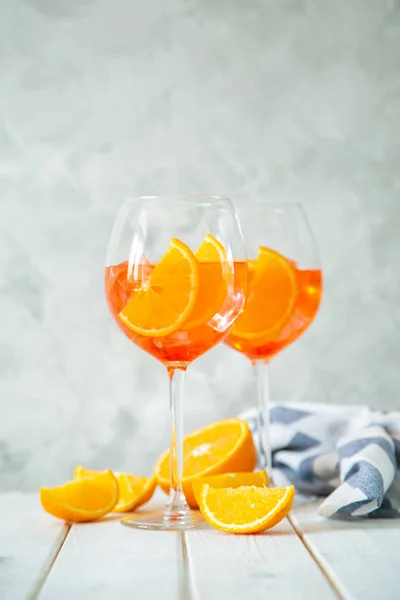 Aperol and ingredients drinks on wood background — Stock Photo, Image