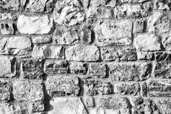 Fondo de la antigua pared de ladrillo de piedra . — Foto de Stock