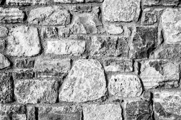 Fondo de la antigua pared de ladrillo de piedra . —  Fotos de Stock