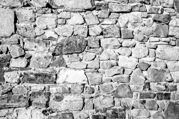 Fondo de la antigua pared de ladrillo de piedra . —  Fotos de Stock