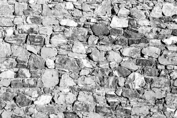 Fondo de la antigua pared de ladrillo de piedra . — Foto de Stock