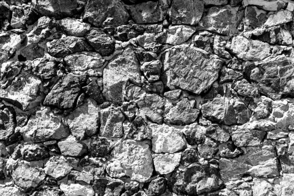 Fondo de la antigua pared de ladrillo de piedra . — Foto de Stock