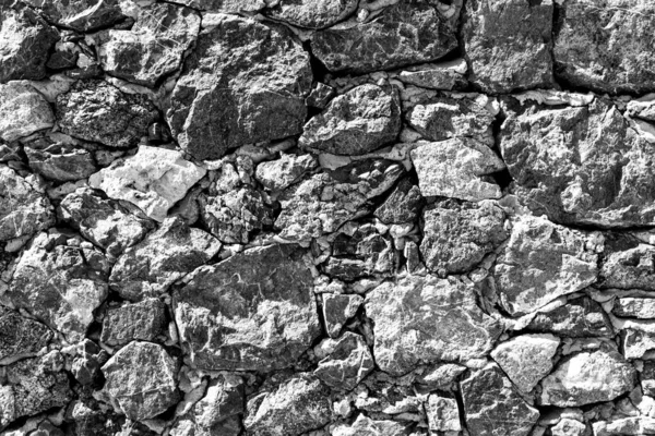 Fondo de la antigua pared de ladrillo de piedra . — Foto de Stock