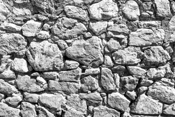 Fondo de la antigua pared de ladrillo de piedra . — Foto de Stock