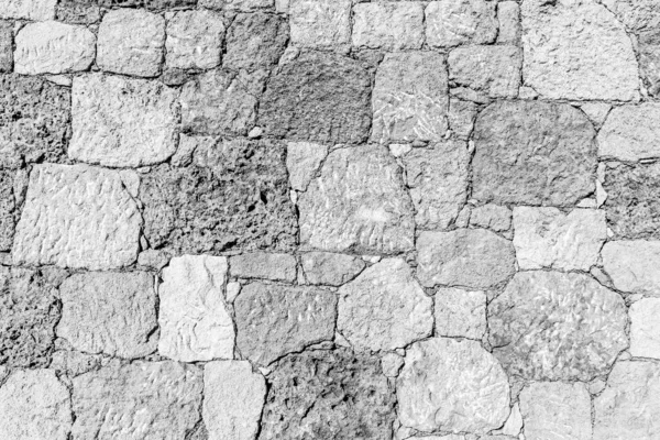 Pozadí staré kamenné cihlové zdi. — Stock fotografie