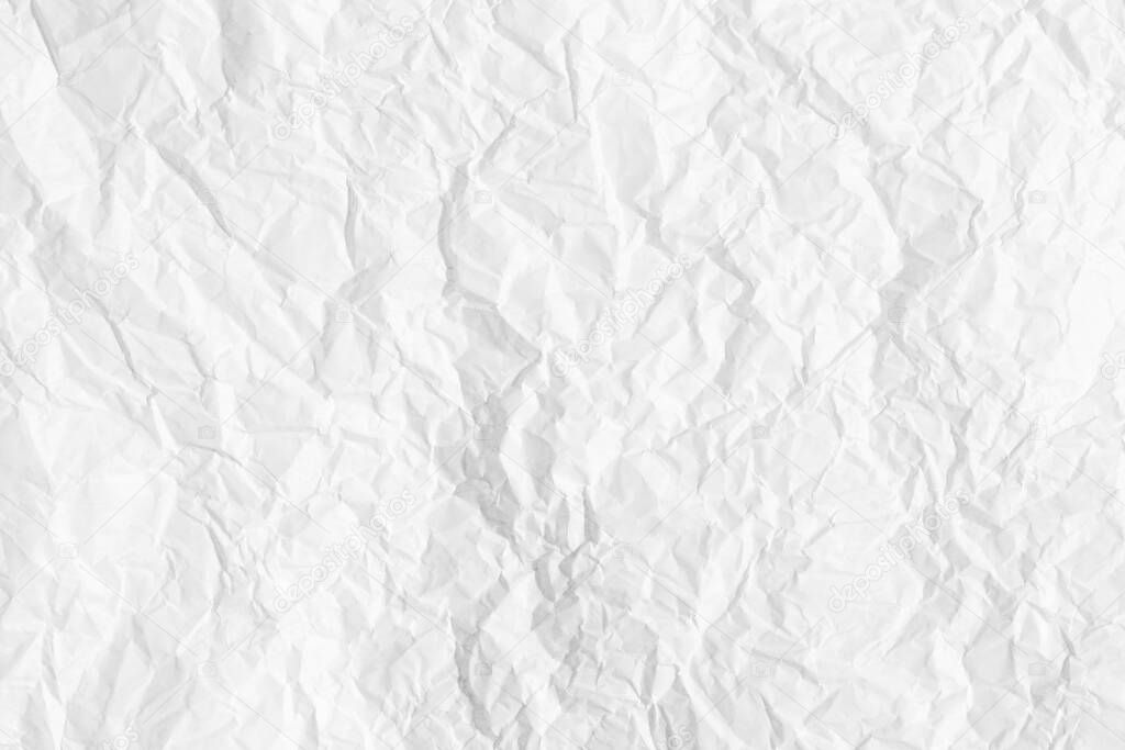 Texture of crumpled white parchment or paper. Abstract background for design. Blank with copy space for a text.