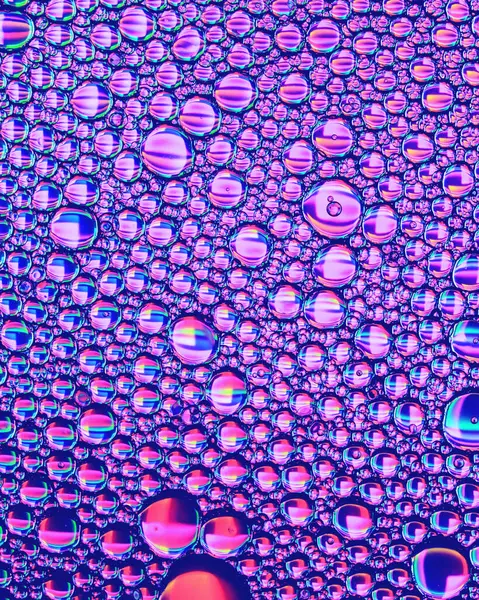 Kolorowe Krople Oleju Wodzie Tęcza Lub Widmo Kolorowych Kółek Ovals — Zdjęcie stockowe