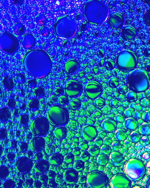 Bovenaanzicht Kleurrijke Druppels Olie Het Water Blauw Groen Violet Gekleurde — Stockfoto