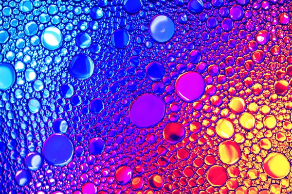 Vista Superior Sobre Unas Coloridas Gotas Aceite Agua Círculos Color — Foto de Stock