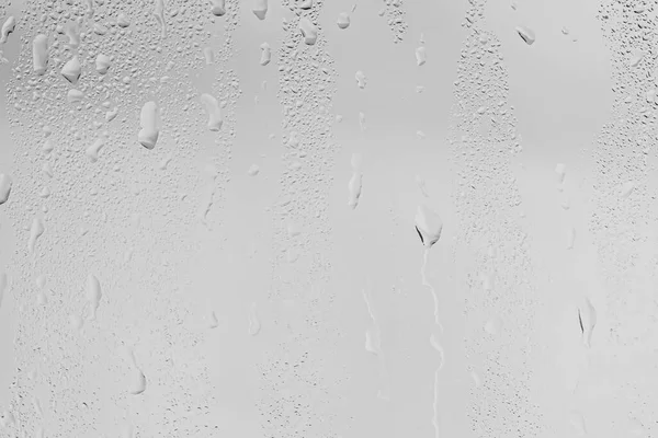 Dešťové Kapky Povrchu Okenních Brýlí Šedou Oblohou Pozadí Přirozené Prostředí — Stock fotografie