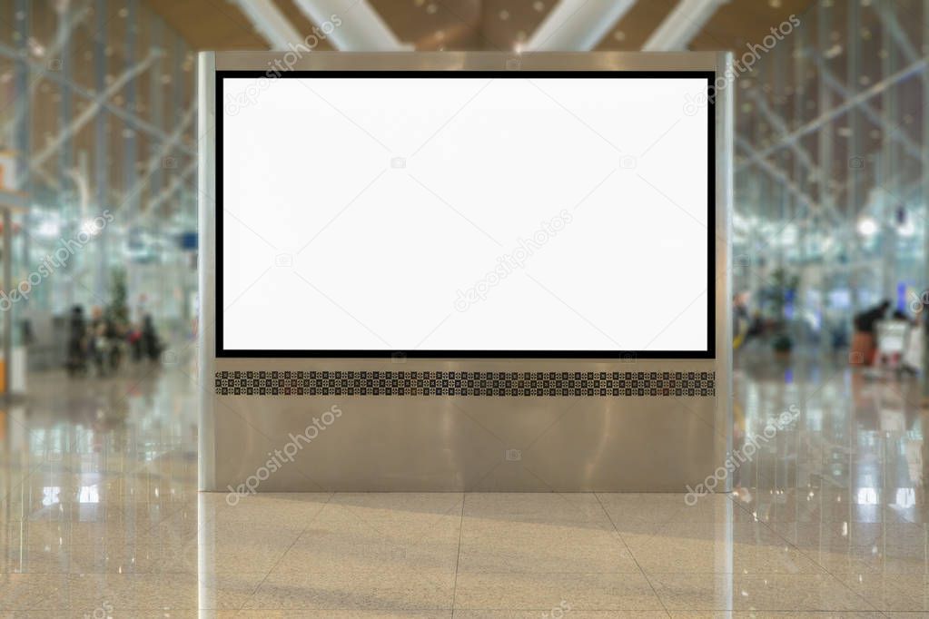 Empty blank lightened billboard for advertisement at airport
