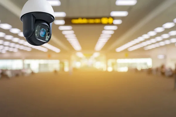 Security camera at checkpoint in airport