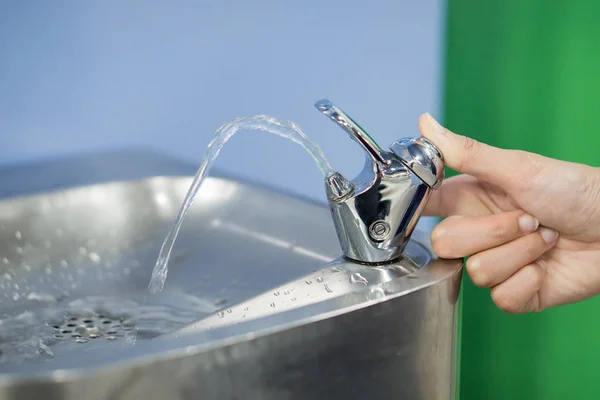 Close Hand Female Pressing Water Tab — Stock Photo, Image