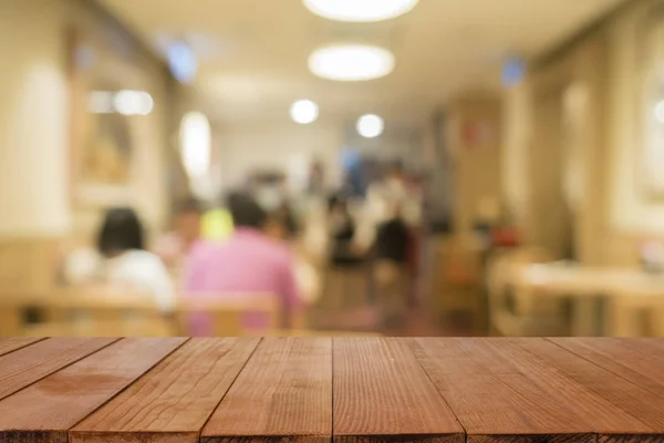 Empty Brown Wooden Table Restaurant Blurred People Background Bokeh Lights — Stock Photo, Image