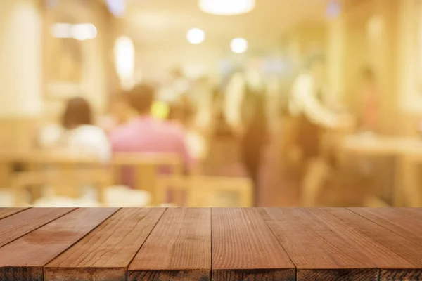 Empty Brown Wooden Table Restaurant Blurred People Background Bokeh Lights — Stock Photo, Image