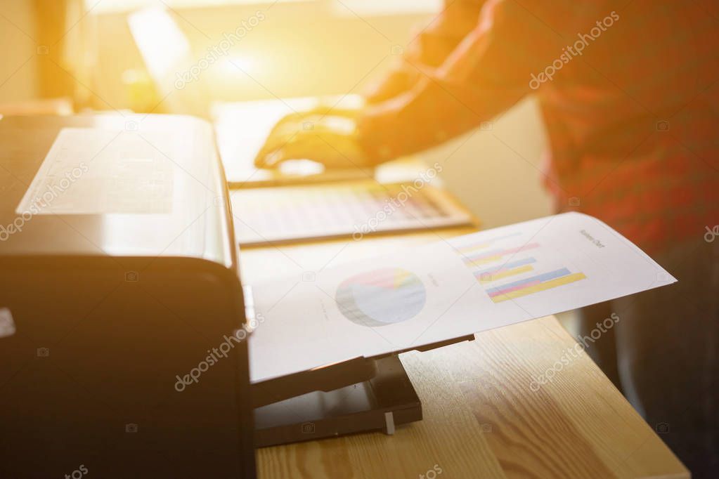 cropped image of Businessman analyzing investment charts and business plan