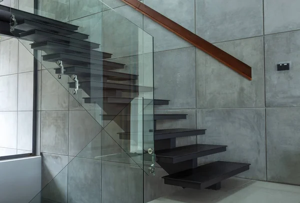 staircase in modern villa and cement wall background.