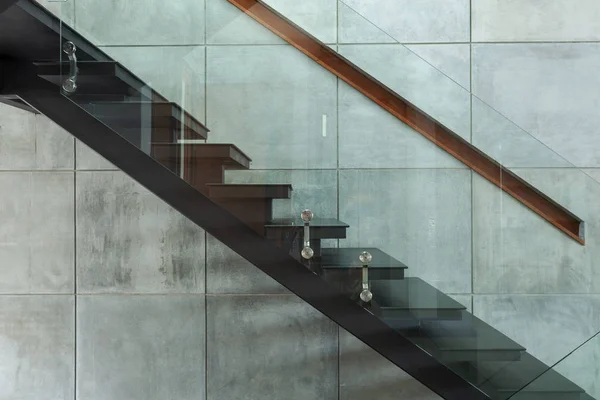 staircase in modern villa and cement wall background.
