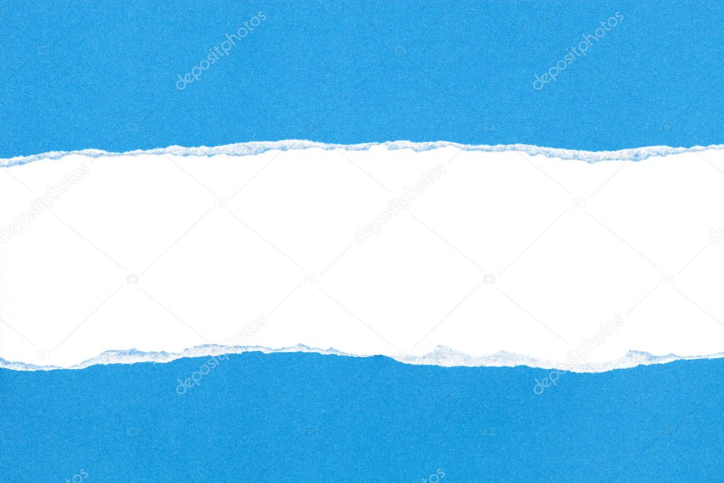 Blue ripped open paper on white paper background.