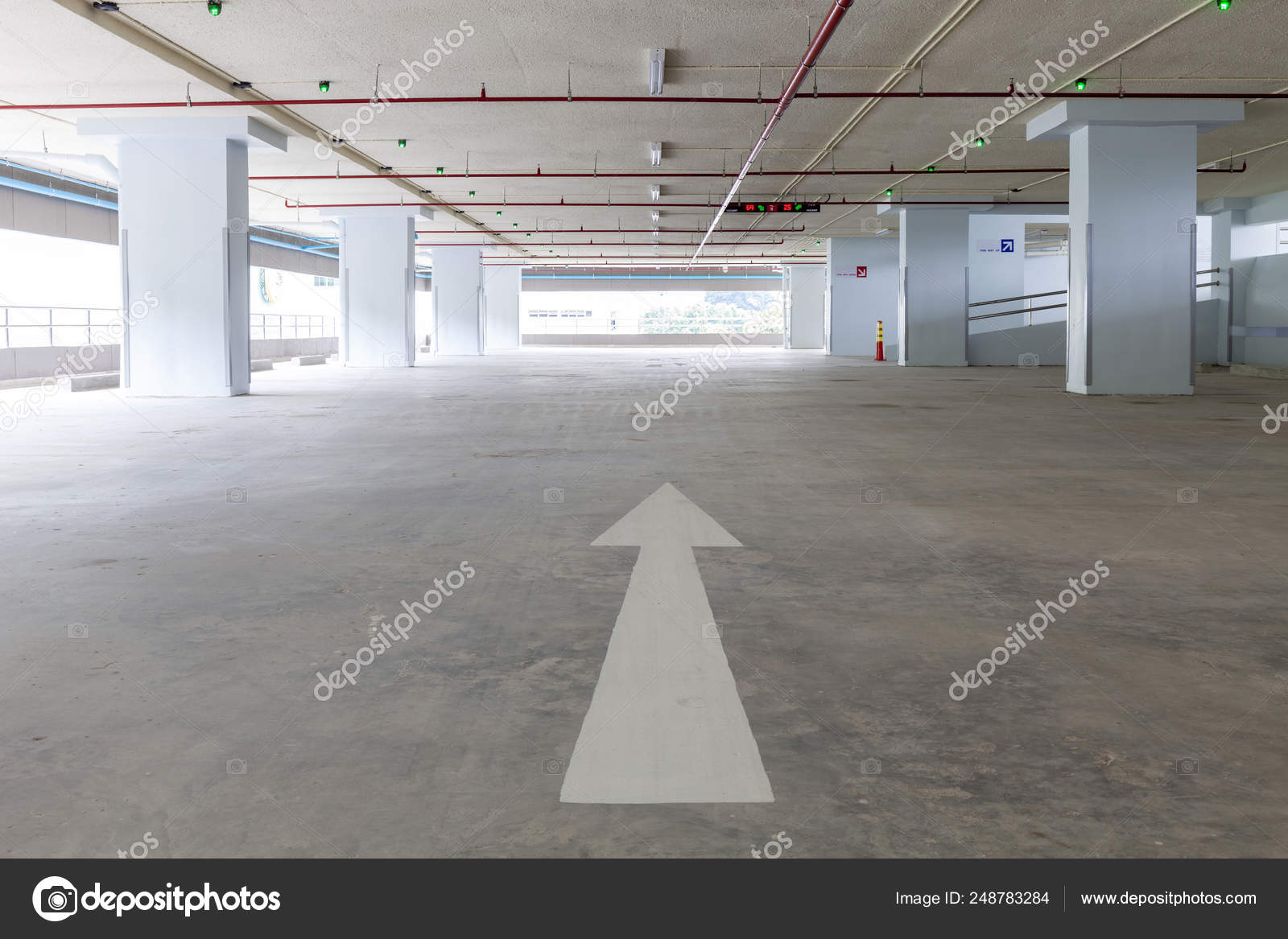 Arrow Sign In Parking Garage Interior Industrial Building Stock