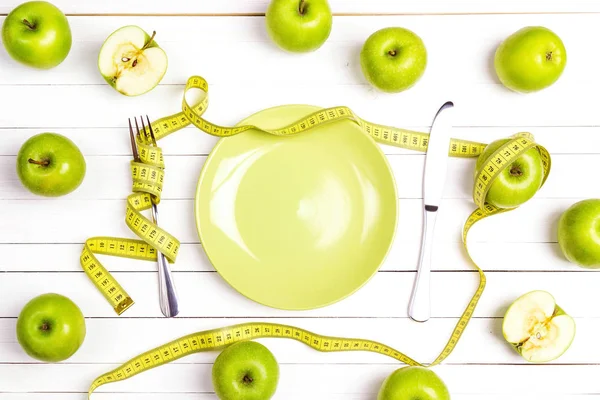Diet Concept Table Setting Cutlery Yellow Measuring Tape Green Apples — Stock Photo, Image